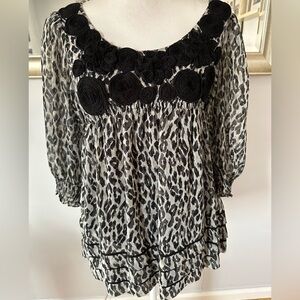 eci New York animal print top size 6